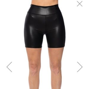Akira high rise biker shorts with four way stretch in black- size medium